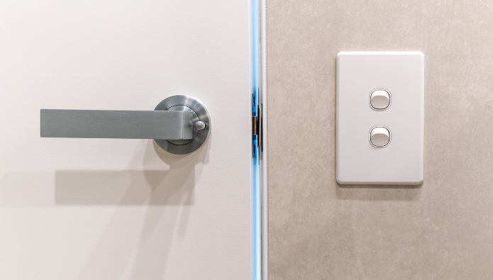 rengøring af toiletter og badeværelser på arbejdspladser - Dørhåndtag og lyskontakter i toilet- og baderummet